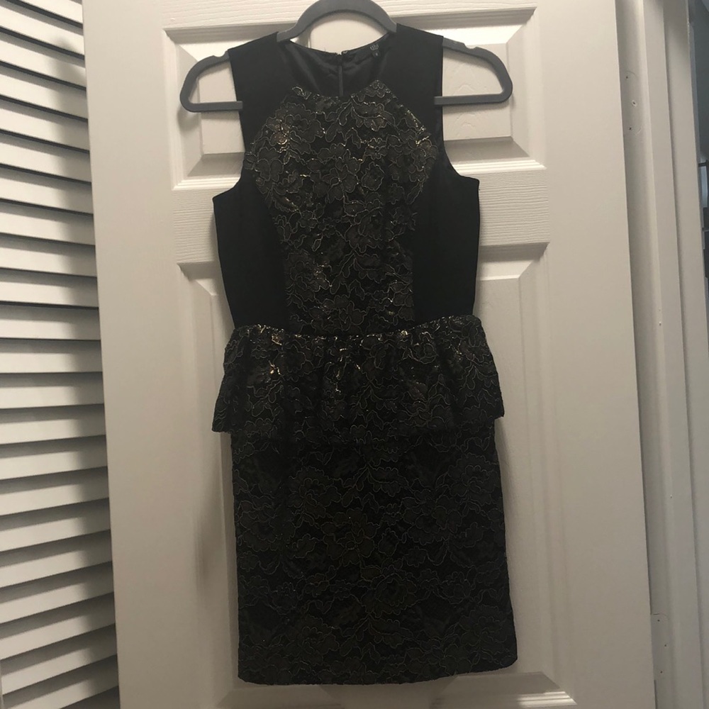 Black and gold peplum dress